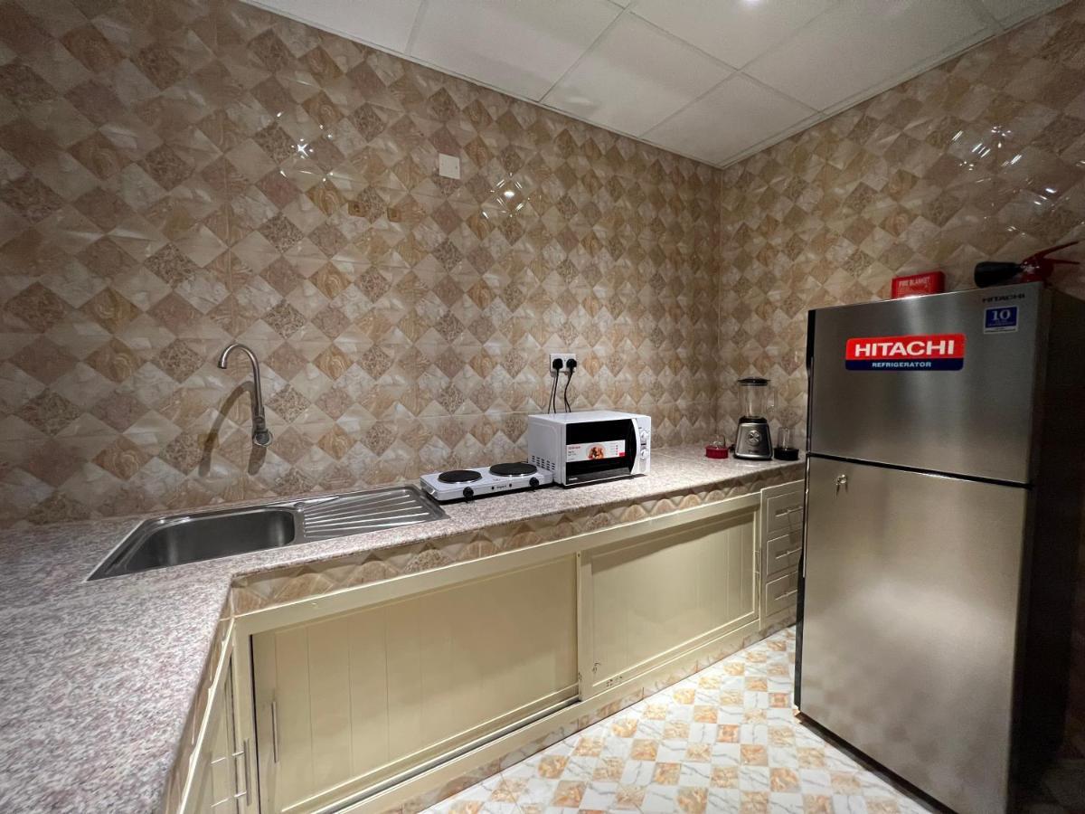 Aalia Hotel Suites Сухар Экстерьер фото